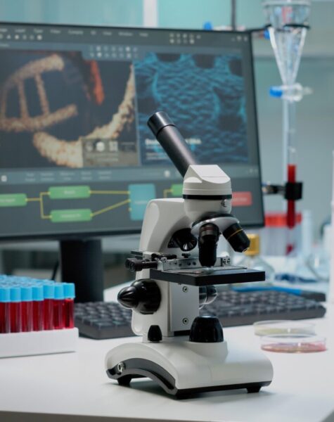 scientific-microscope-laboratory-desk-with-researching-instruments